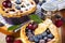 Decorated homemade shortcrust pastry berry pies