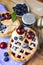 Decorated homemade shortcrust pastry berry pies