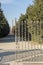 Decorated iron gate at historical industrial village, Crespi on