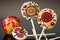 decorated with multi-colored pomegranate seeds handmade lollipops from italy