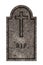 Decorated, oval granite tombstone on white background with engraved R.I.P. lettering and cross