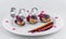 Decorated plate of chocolate round eclair with cherry