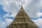 Decorated prang of famous Wat Pho, Temple of Reclining Buddha in Thailand