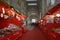 Decorated with red kiosks large corridor of the Milan Central railway station.