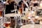 Decorated table setting with champagne glasses and candle holders with burning candles