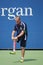 Decorated US Army Veteran Ryan McIntosh with carbon-fiber prosthetic right leg works as US Open ballperson at US Open 2014