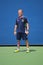 Decorated US Army Veteran Ryan McIntosh with carbon-fiber prosthetic right leg works as US Open ballperson at US Open 2014