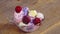 Decorating ice cream balls with topping and glaze