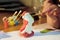 Decorating Santa Claus by paint