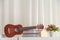 Decoration in bedroom with mini guitar and book with flower