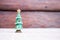 Decoration Christmas tree ceramic on wood background