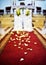 Decoration church to wedding ceremony petals on a red carpet