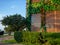 Decoration of the facade of the building with artificial flowers. Building in flowers. Resort place. Facades of buildings.