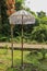 Decoration of Hindu temple complex Batukaru on Bali island in Indonesia. Yellow and white decorative umbrellas line the path for