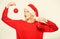 Decoration pleasant routine. Woman santa hat hold two balls decor ornament. Add decorative details. New year decor