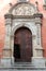 Decorations of the Cathedral facade in Granada, details, sculptures, one of the side doors, Spain