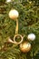 Decorations in a Christmas tree with globes and a French horn