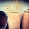 Decorative allium plants in clay vase