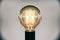 Decorative antique edison style light bulb.Beautiful retro luxury light lamp decor glowing selective focus film grain style effect