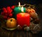 Decorative autumn candles burning with pumpkins and decorations