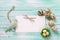 Decorative bird, Easter eggs and empty tag on wooden background