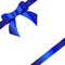 Decorative blue bow with two diagonally ribbons on the corner.