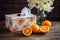Decorative box of tissues and fresh oranges on a rustic table