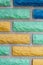 Decorative brick texture background. Stock photo multi-colored brick. Decorative brick poured out of forms