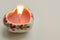 Decorative burning candle in the shape of a heart