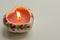 Decorative burning candle in the shape of a heart
