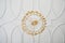 Decorative ceiling molding with crystal gold chandelier. Bottom view