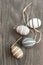 Decorative ceramic eggs on wooden background