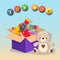 Decorative children\\\'s toys set in an open paper box on a sky blue background