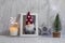 Decorative christmas tree,   card  candle seasonal decoration party on wooden background