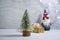 Decorative christmas tree, gnome  candle seasonal decoration party on wooden background