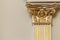 Decorative column with golden portico