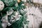 Decorative disco ball close-up. Decorated Christmas tree on blurred, sparkling fairy background
