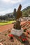 A decorative eagle cast in bronze stands on a pedestal in the Bahai Garden, located on Mount Carmel in the city of Haifa, in