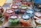 Decorative Earthen Diyas and oil lamps for Diwali celebration at a gift shop during festival season.