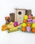 Decorative Easter composition. Birdhouse and Easter eggs. Flowerpots. Spring.