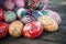 Decorative easter eggs in outdoor on wooden table