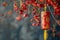 Decorative firecracker with background of ginkgo branch in chinese new year. Lunar New Year holidays