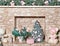 Decorative fireplace with gifts, Christmas trees, toys, balls and fir branches on the eve of Christmas and New Year