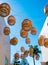 Decorative Floating lanterns hang above an alleyway in Malibu.