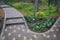 Decorative flower bed and stairs of stone blocks.