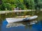 Decorative flowerbed boat in the plant park. Landscaping