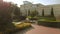 Decorative fountain in a well-groomed mansion yard.