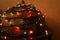 Decorative globe illuminated by Christmas red-and-green garland