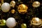 Decorative gold and greeen glass christmas ornament balls on pine tree