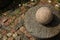 Decorative granite ball and round base on a pavement